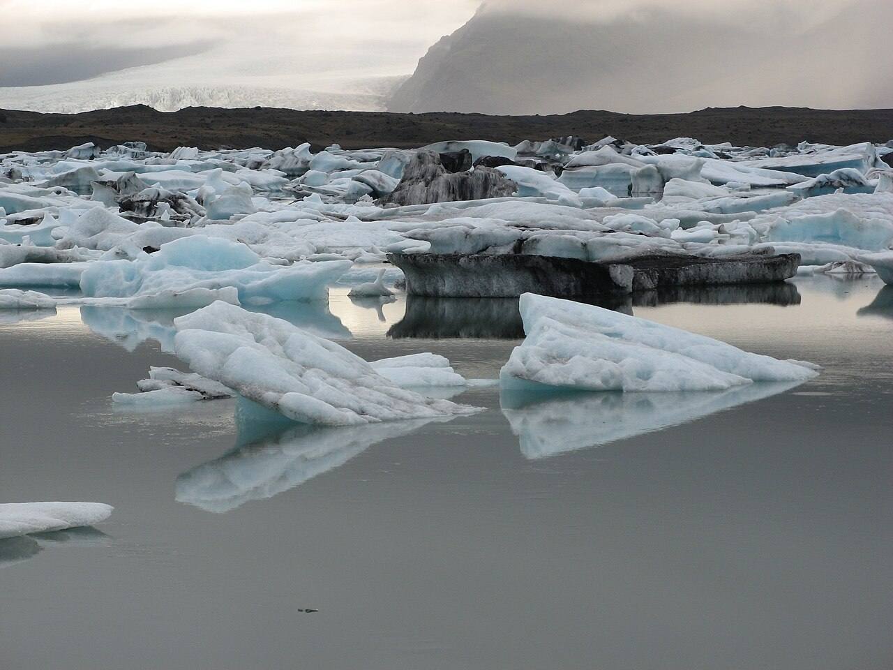 Blue icebergs in the still water of Jökulsárlón